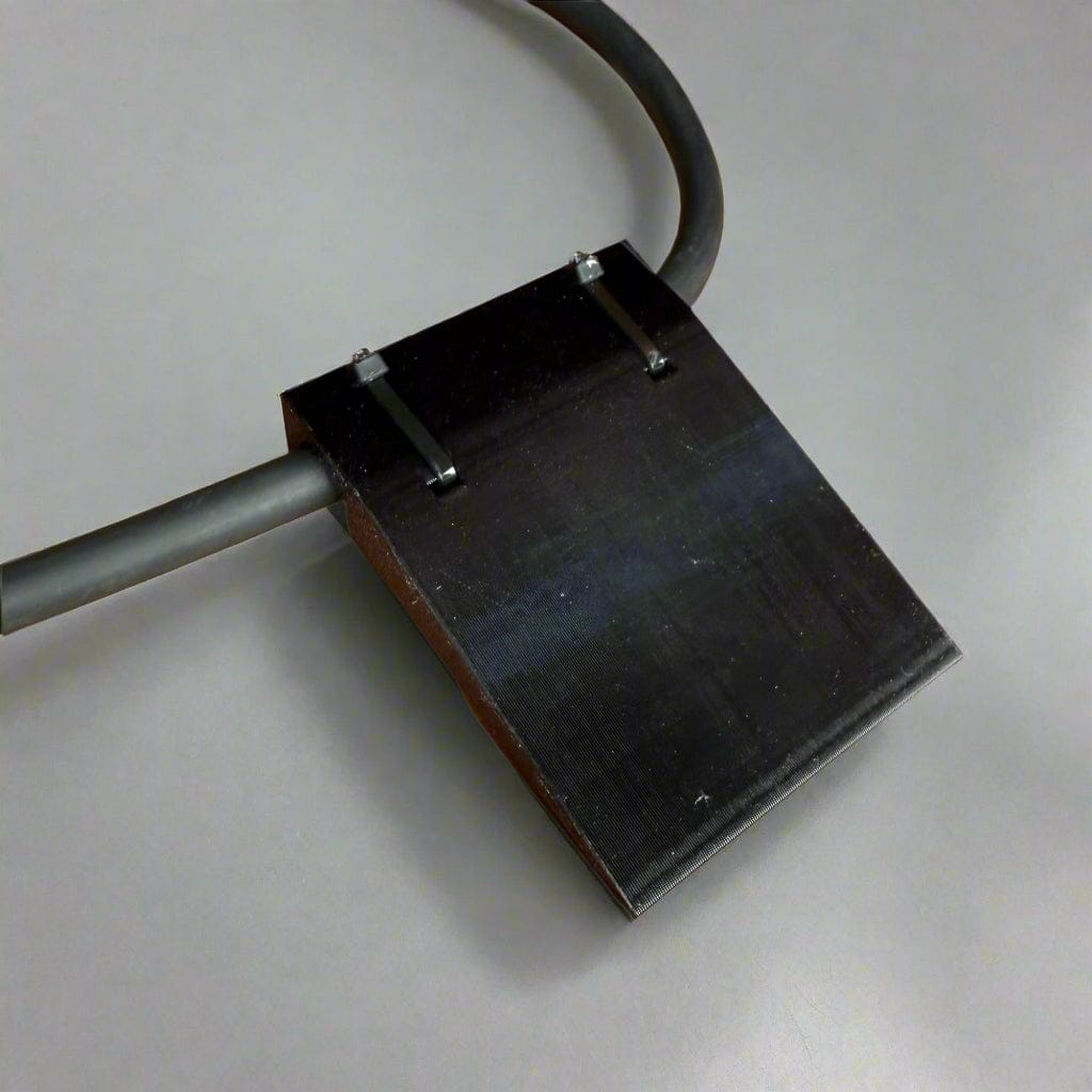 Side-mount EV charging cable garage door pass-through protector